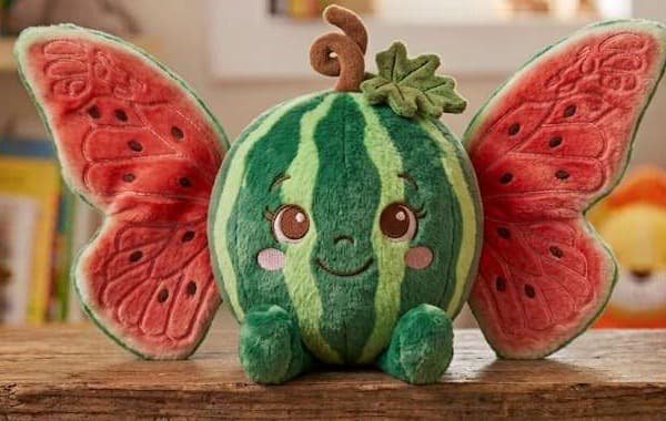 RuhPlush concept render, the Watermelon character, on a wooden shelf